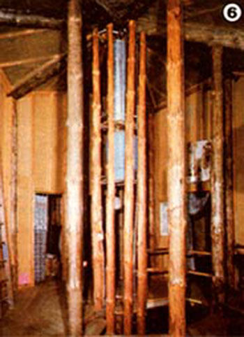 By placing the pressure tank from their well high in the central column, Eric guaranteed that they'll have at least a limited supply of gravity-fed water during a power outage.